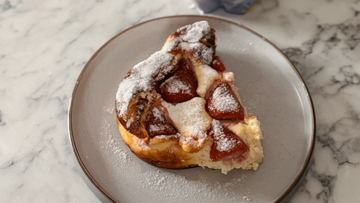 Keto strawberry ricotta soufflé bake served in a dish