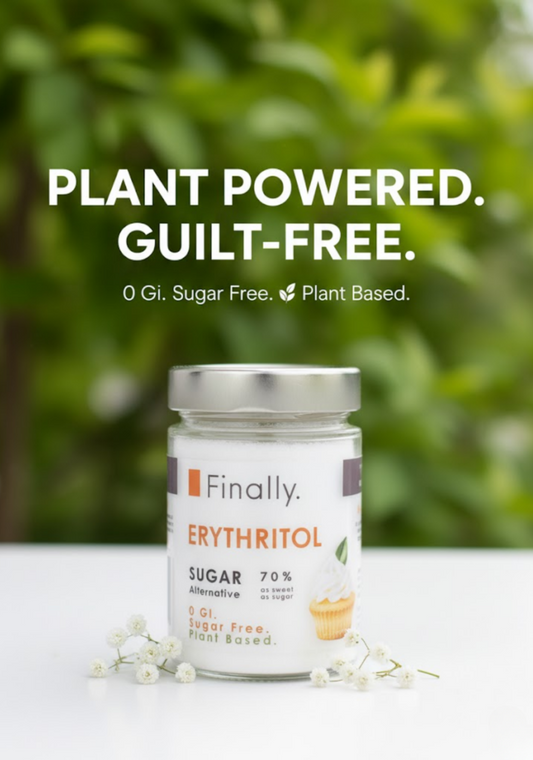 Jar of Finally. Erythritol with greenery in the background